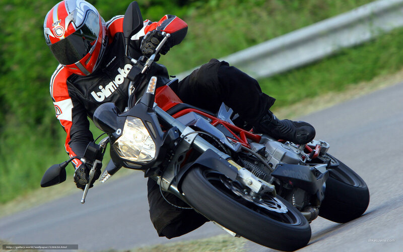 motorcyclist leaning in turn