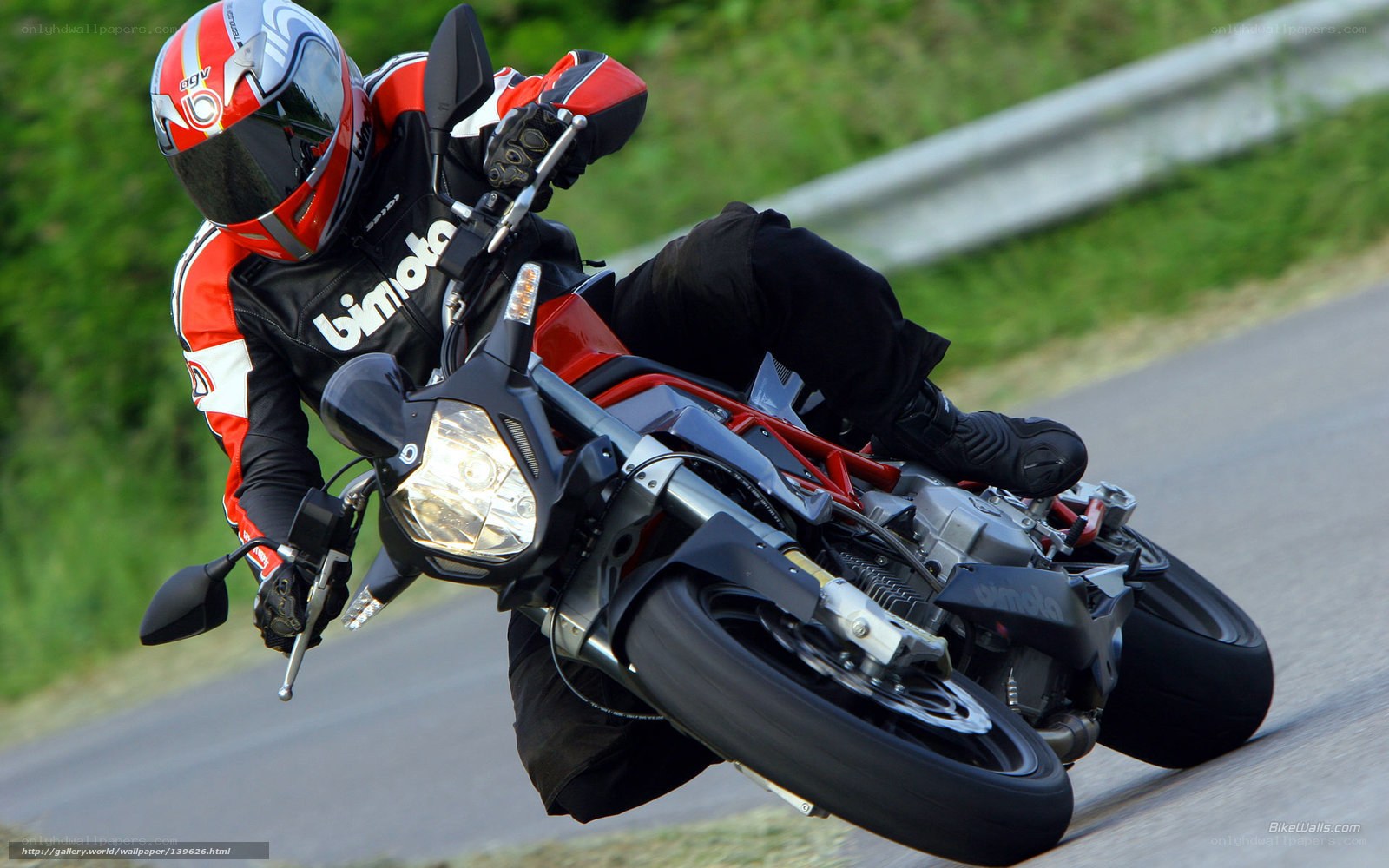motorcyclist leaning in turn