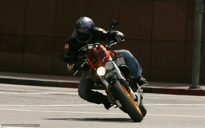 motorcyclist leaning in turn