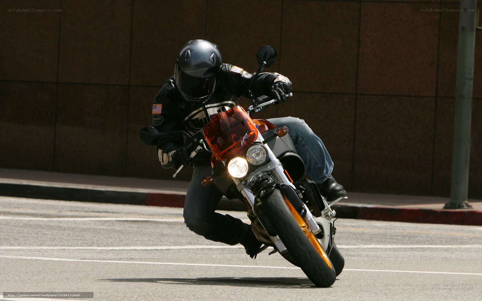 motorcyclist leaning in turn