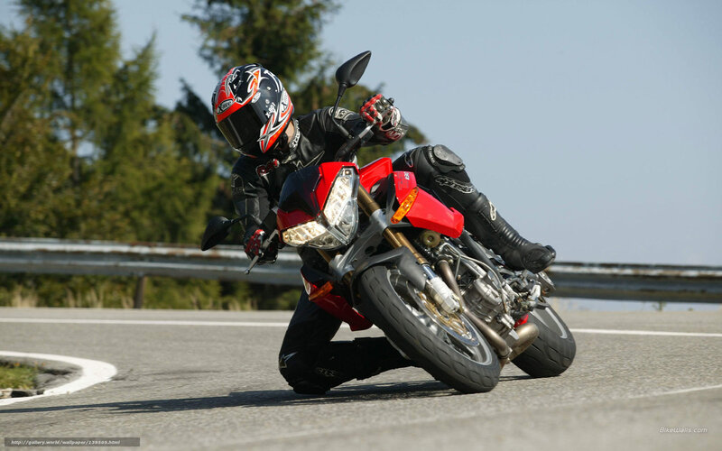 motorcyclist leaning in turn