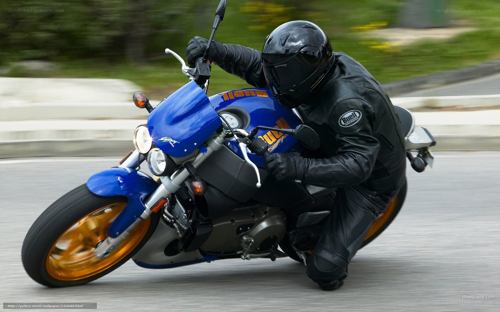 motorcyclist leaning into turn