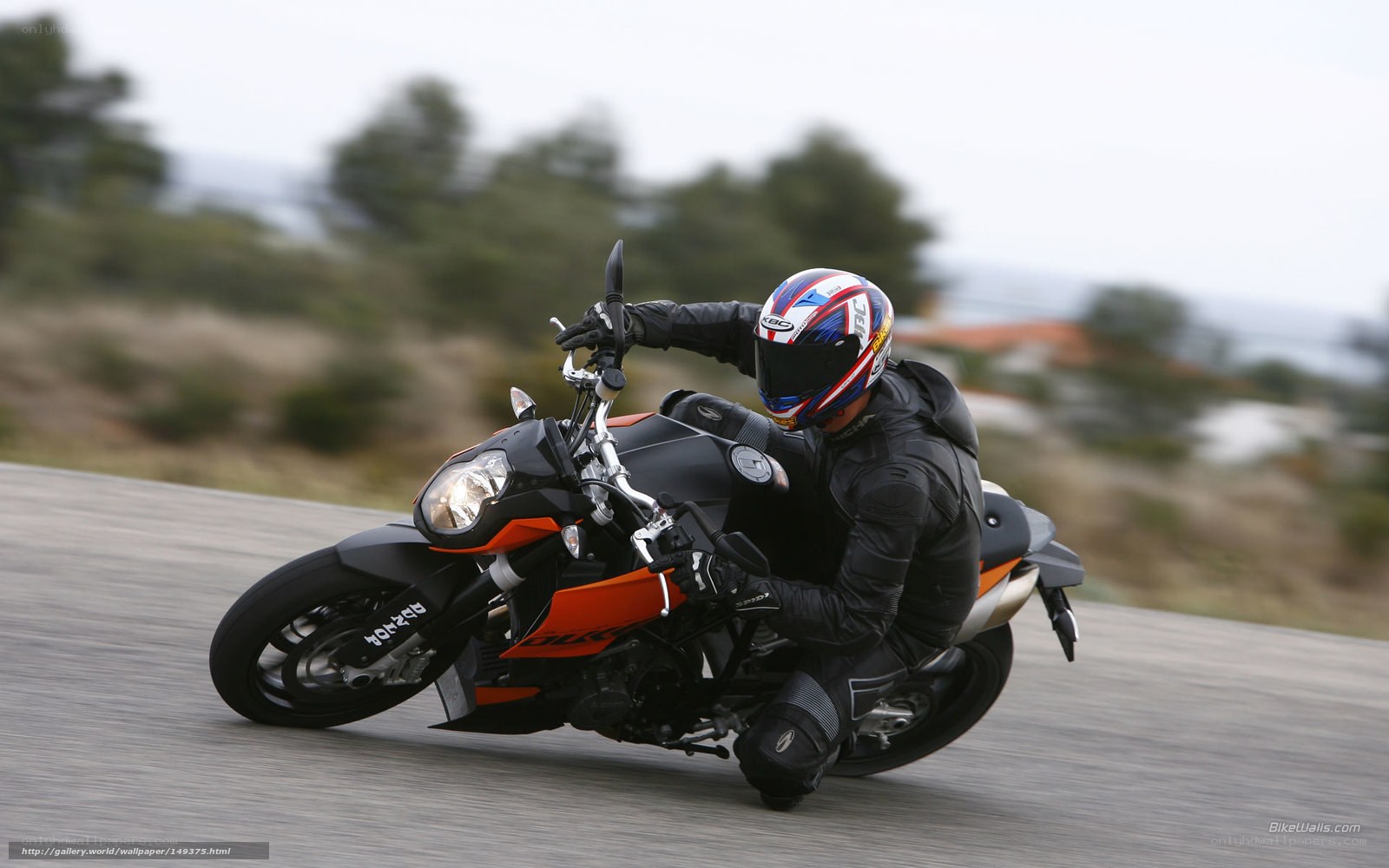 motorcyclist leaning into turn