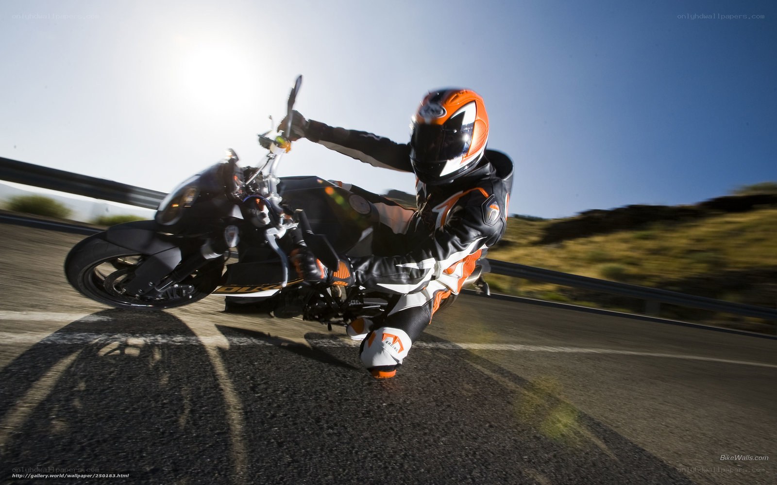motorcyclist leaning into turn