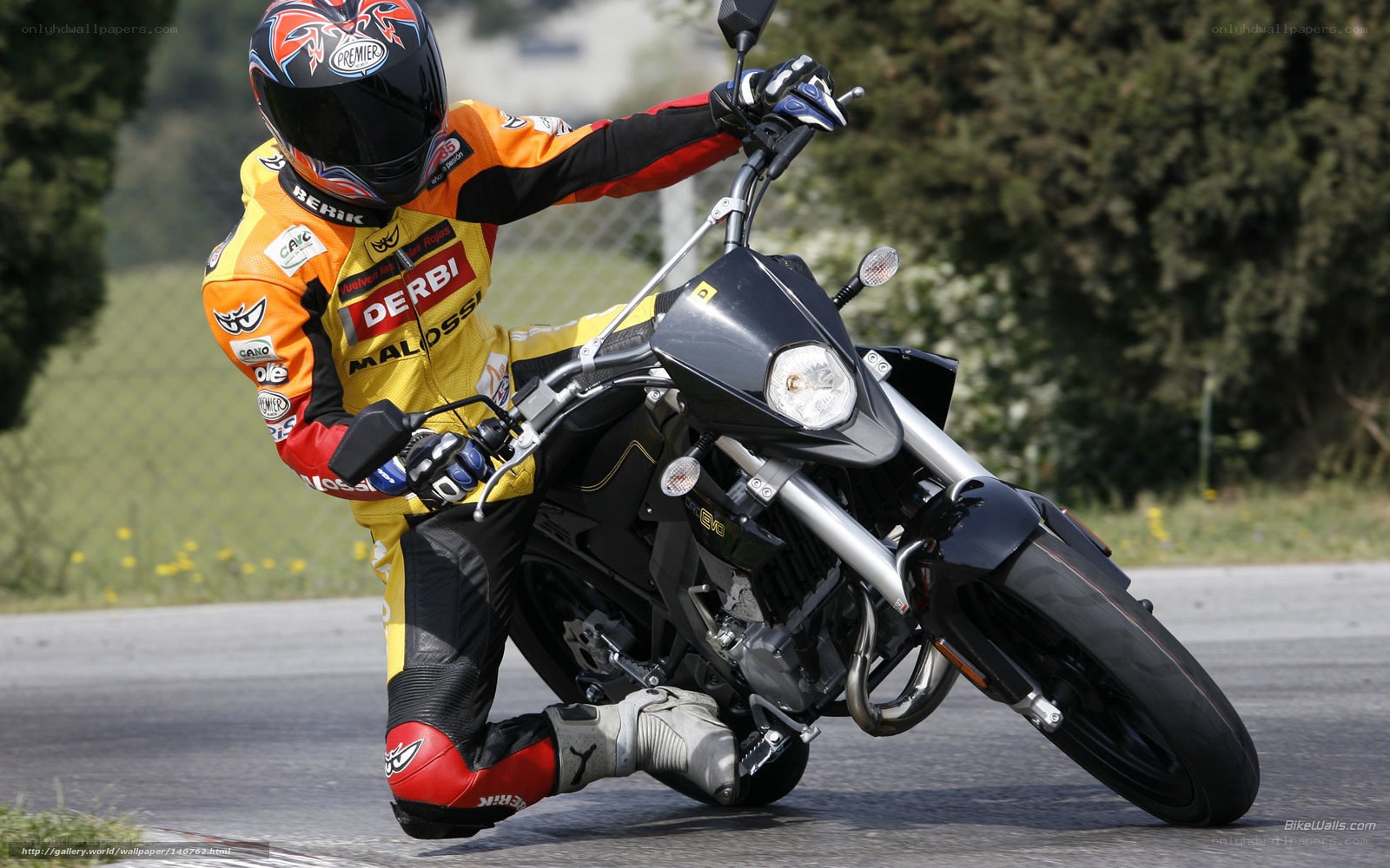 motorcyclist leaning into turn