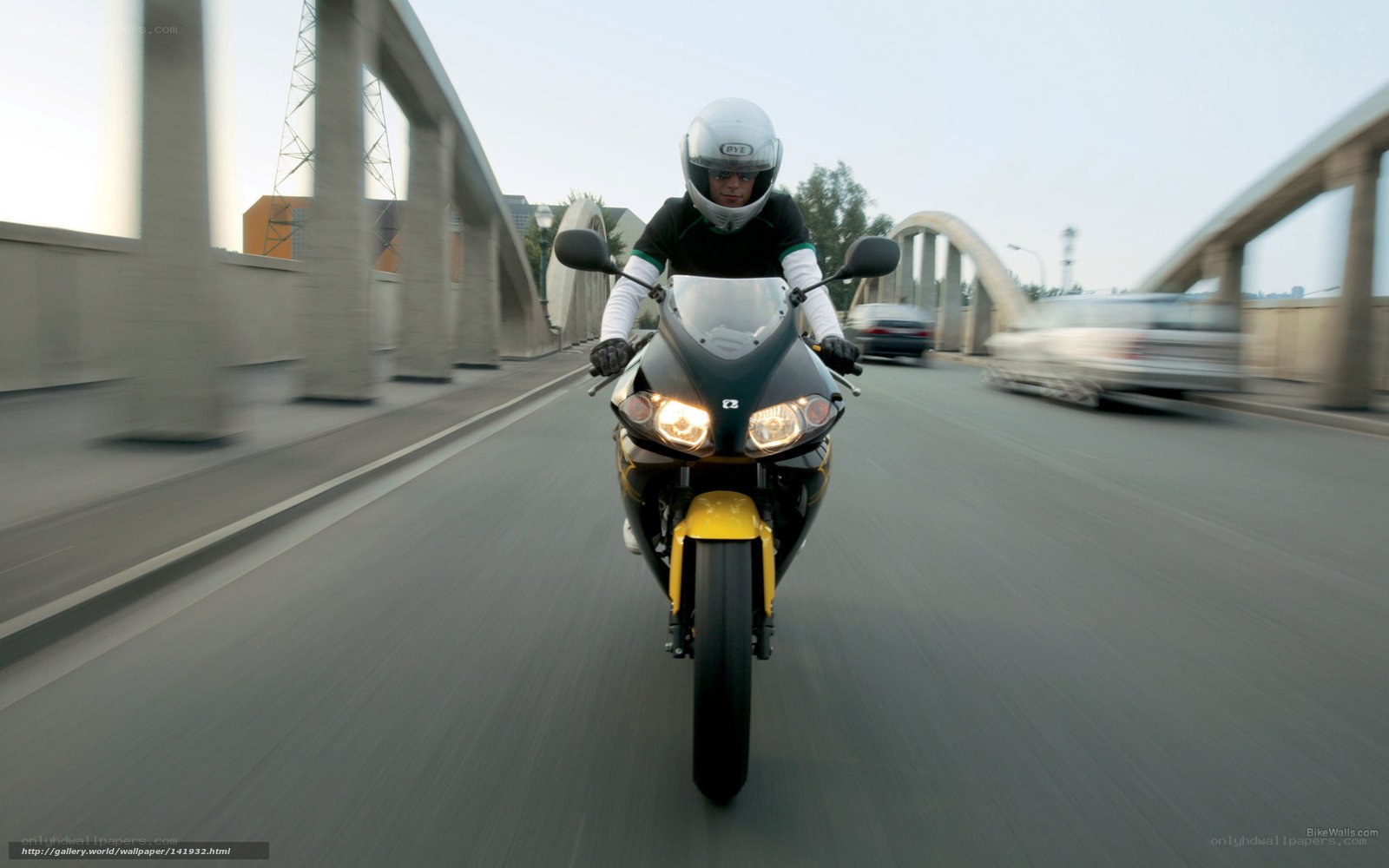 motorcyclist on a bridge
