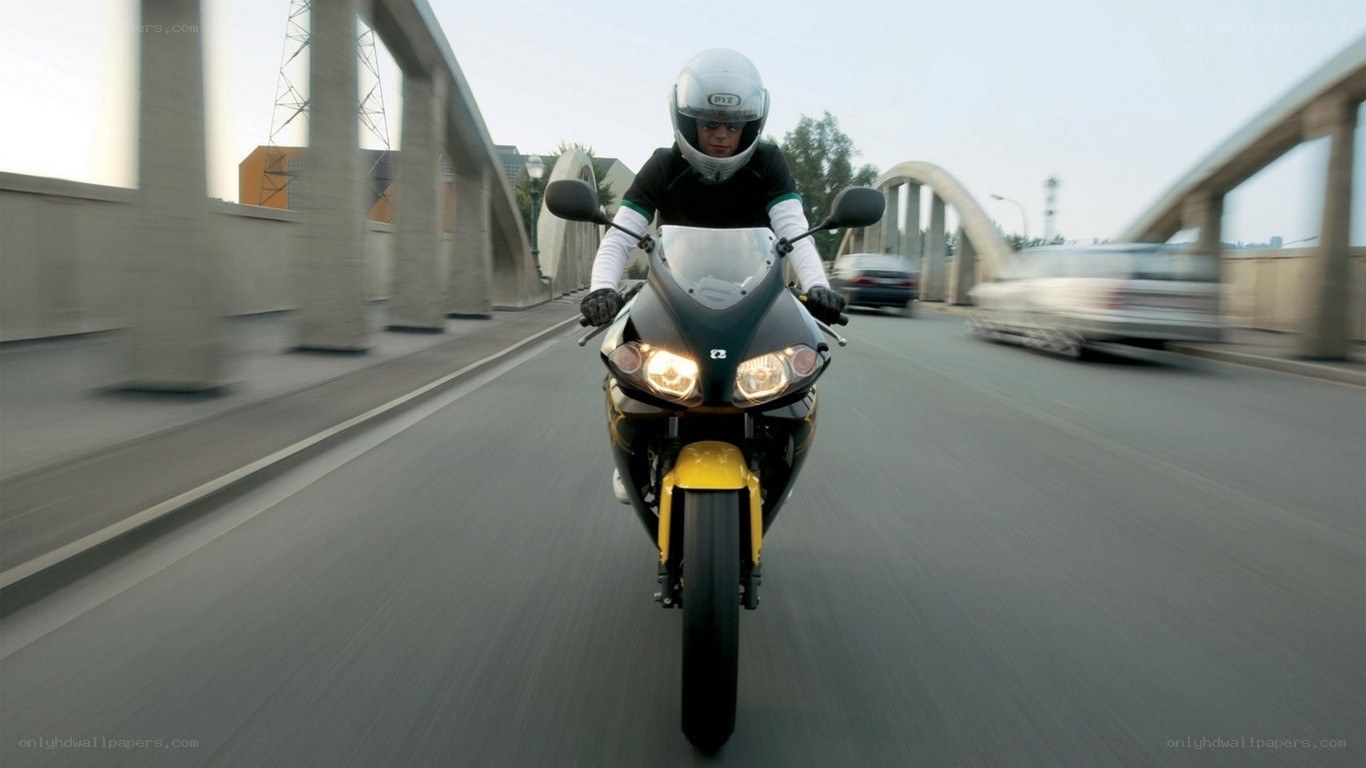 motorcyclist on a bridge