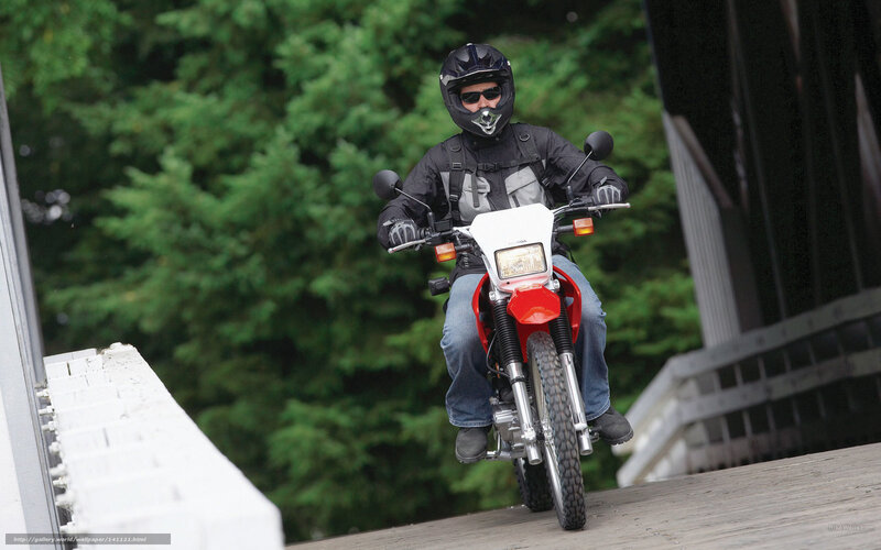 motorcyclist on a bridge