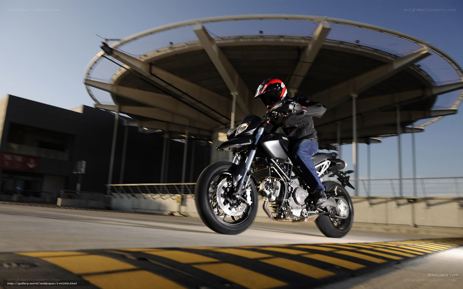 motorcyclist on a city overpass