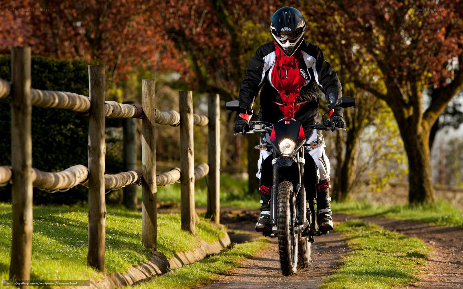 Motorcyclist on a country path