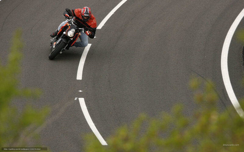 Motorcyclist on a curved road