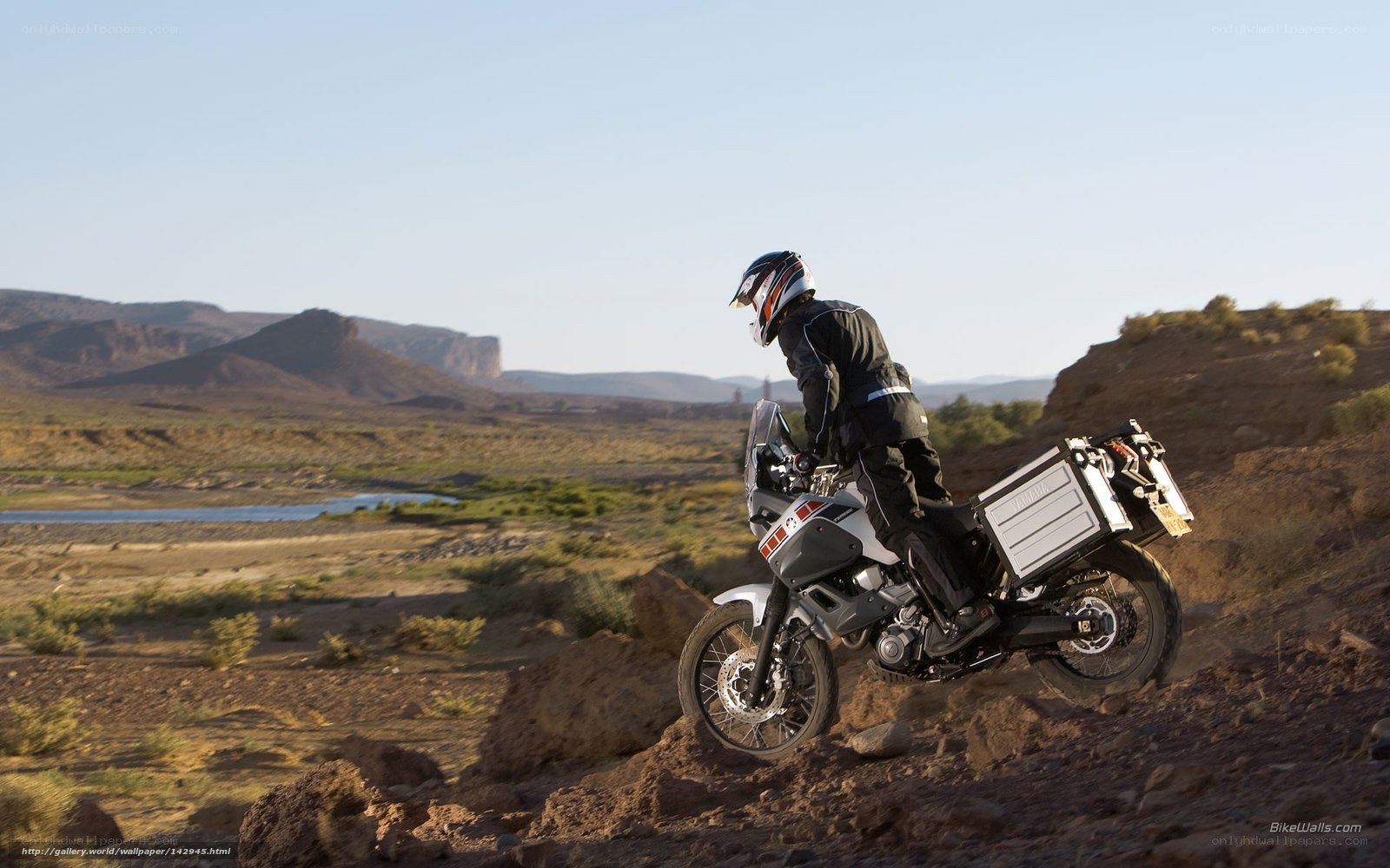 Motorcyclist on a desert trail