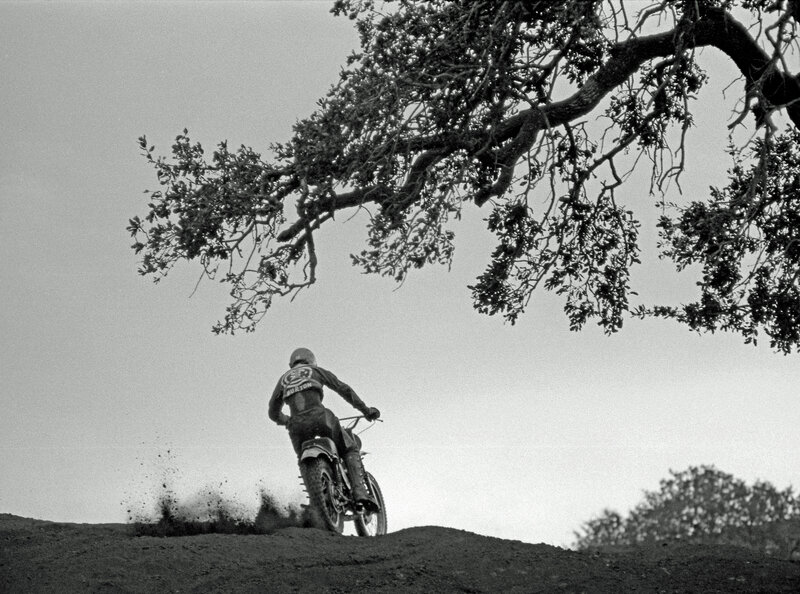 Motorcyclist on a dirt hill