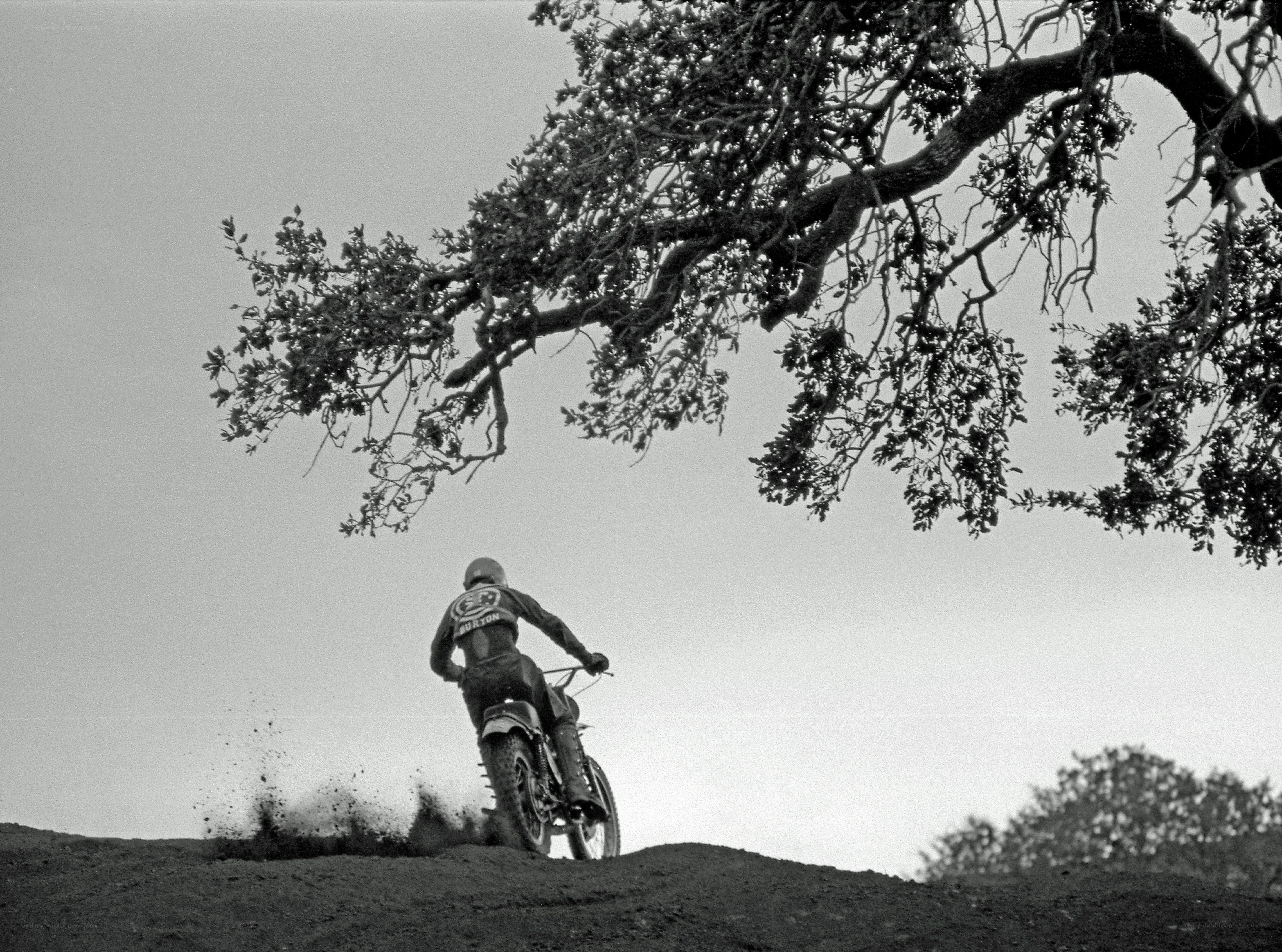 Motorcyclist on a dirt hill