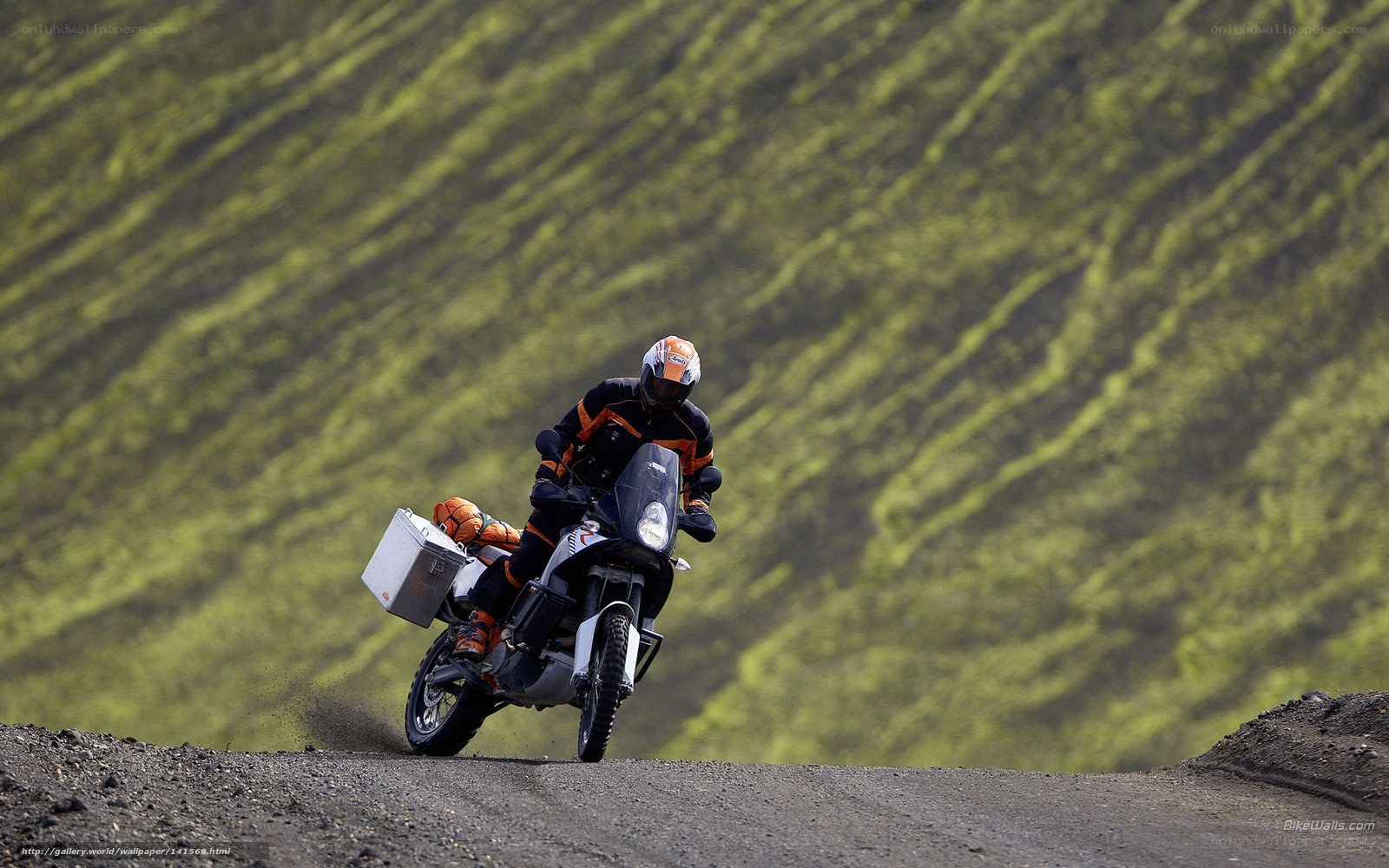 Motorcyclist on a dirt road