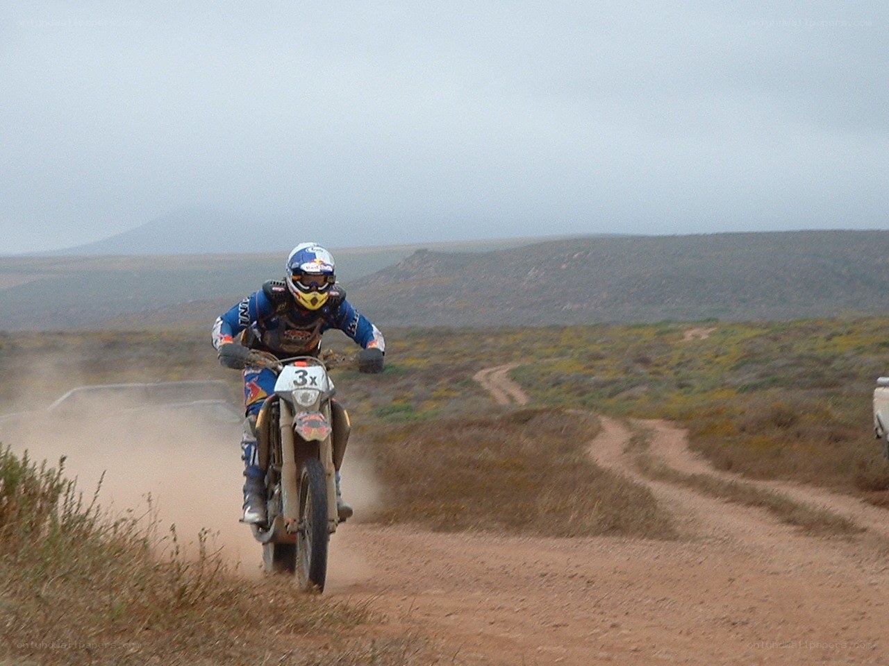 Motorcyclist on a dirt track