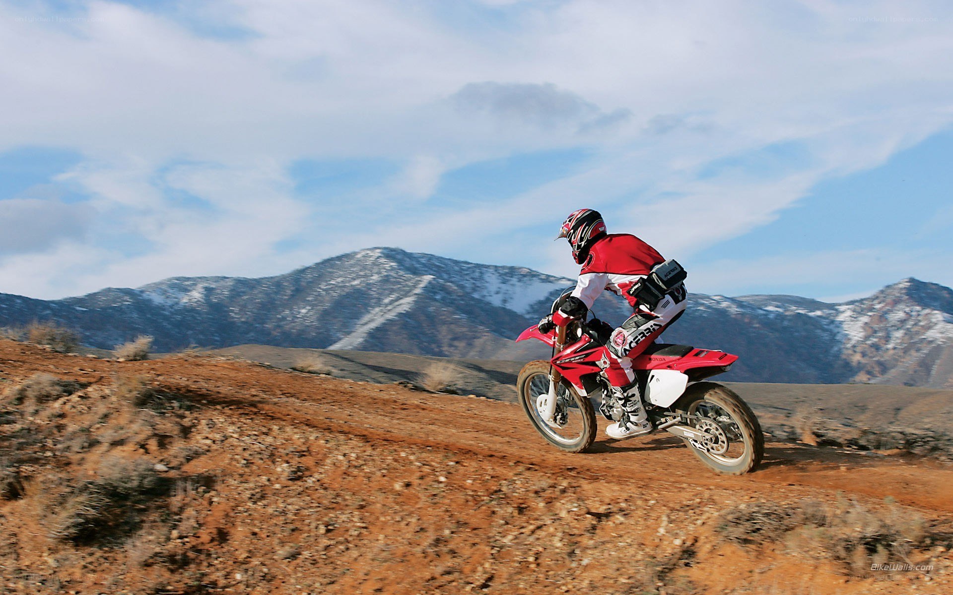 Motorcyclist on a dirt trail