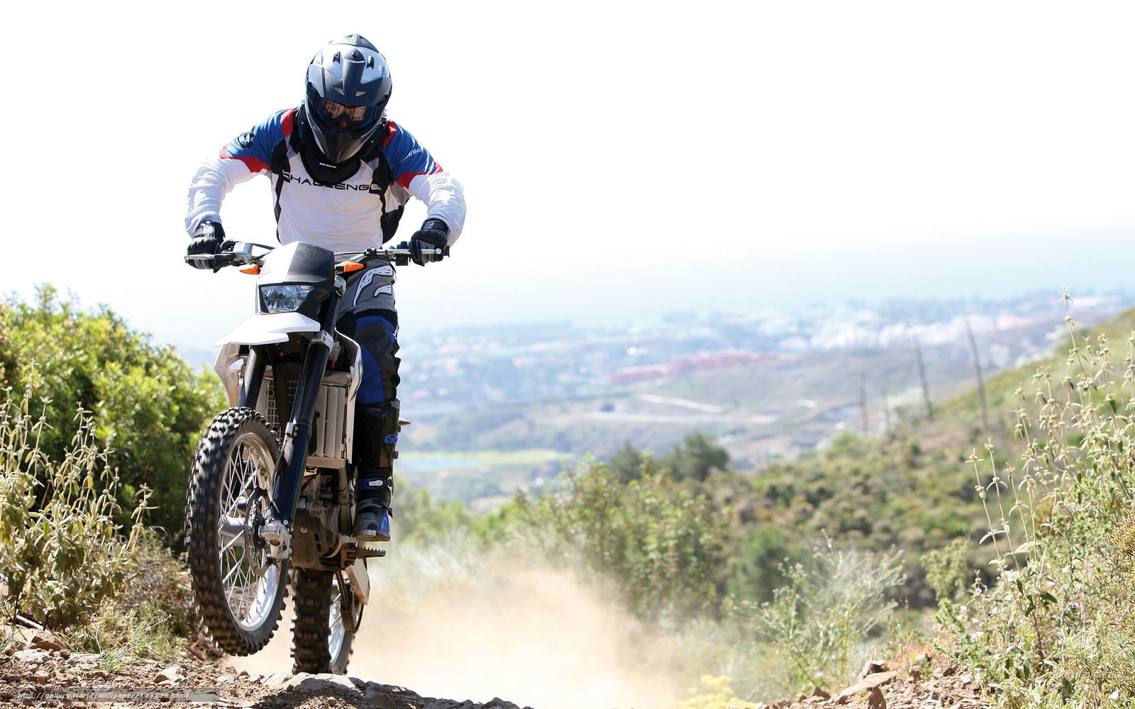 Motorcyclist on a dirt trail