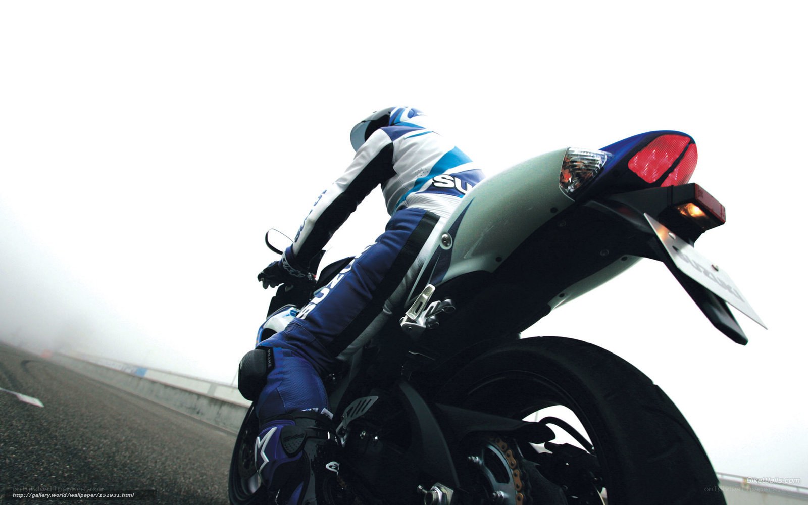 motorcyclist on a foggy road