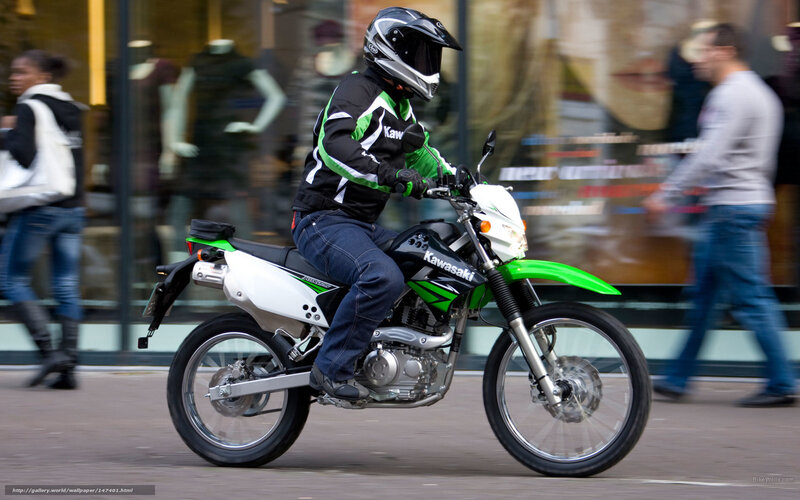 Motorcyclist on a Kawasaki bike