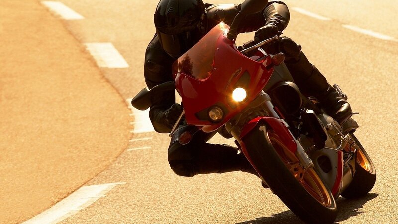 Motorcyclist on a red bike