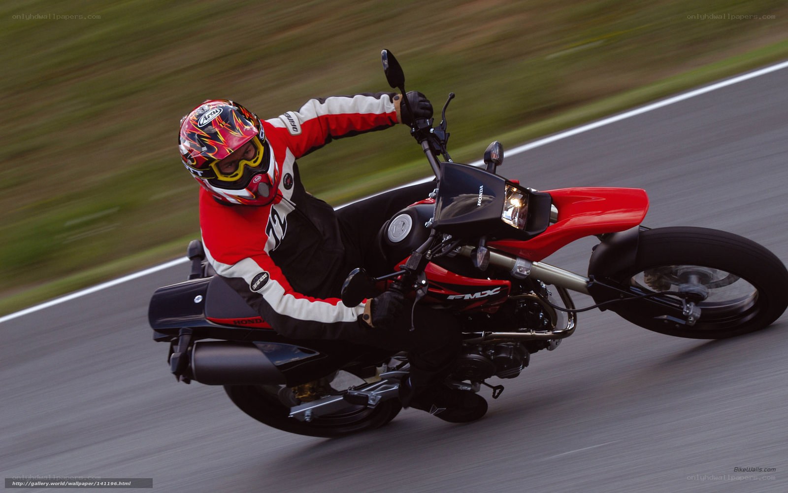 Motorcyclist on a red bike