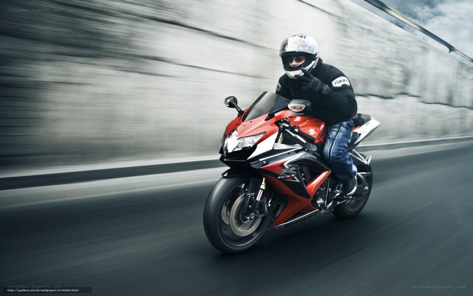 Motorcyclist on a red sportbike