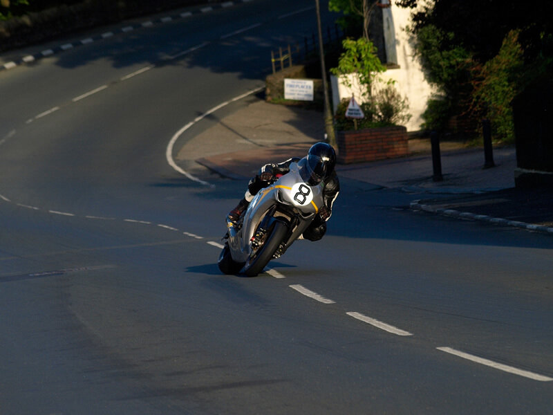 Motorcyclist on a Road — Gray