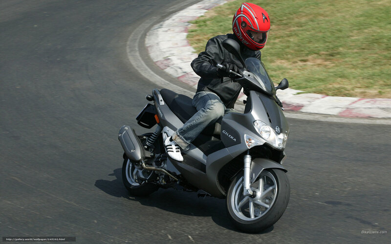Motorcyclist on a Scooter