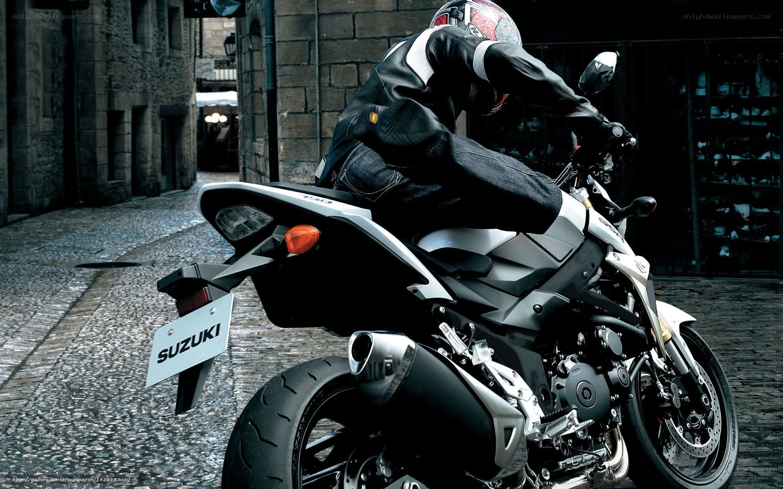 Motorcyclist on a Suzuki bike