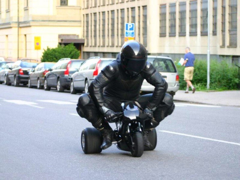 Motorcyclist on a three-wheeled bike