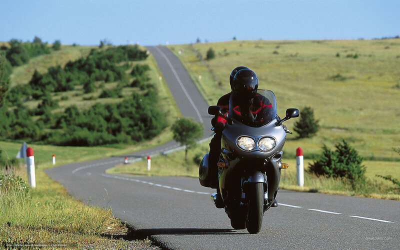 Motorcyclist on a winding road