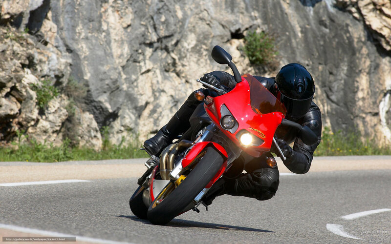Motorcyclist on a winding road