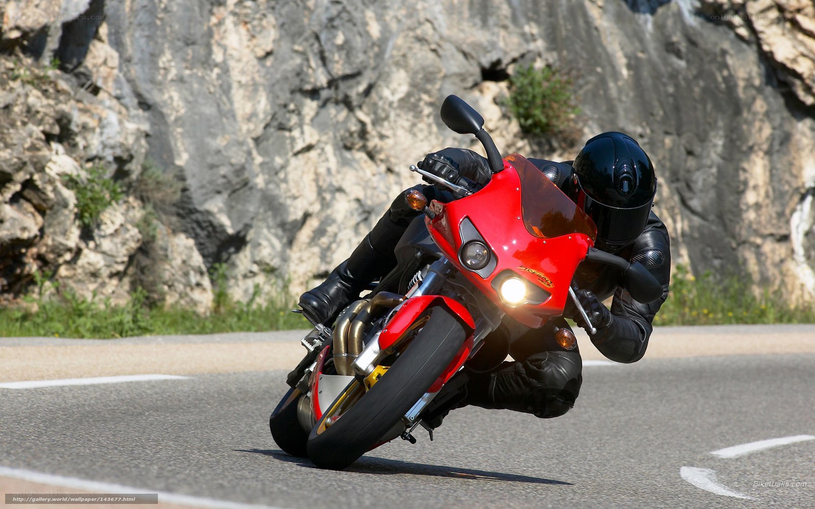 Motorcyclist on a winding road