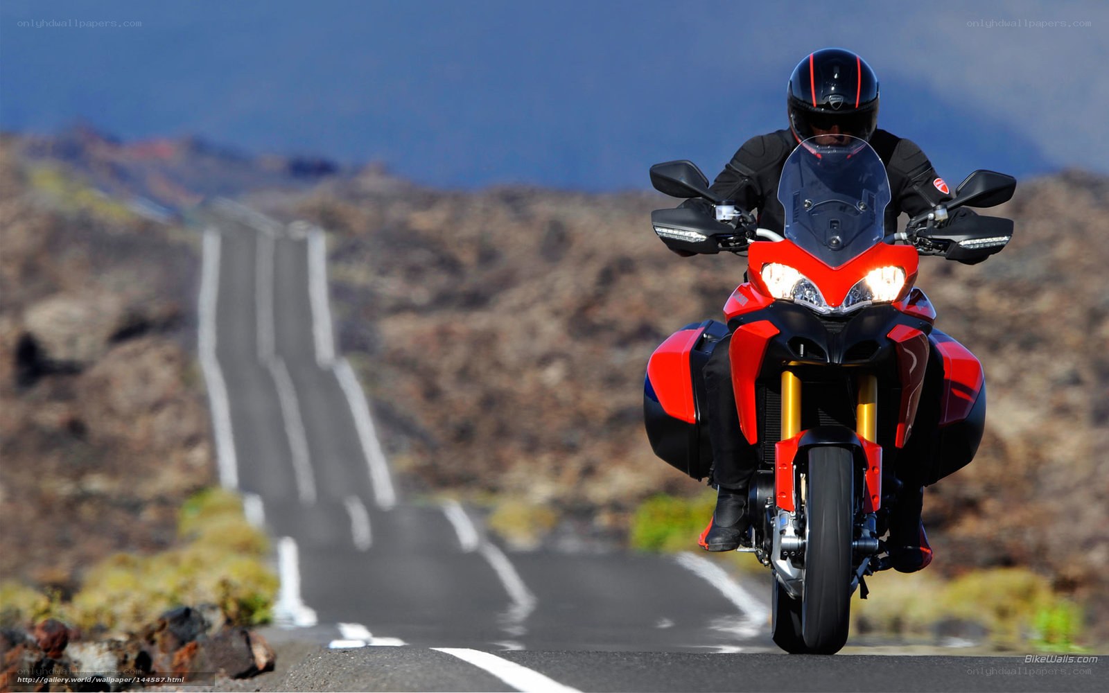 Motorcyclist on a winding road