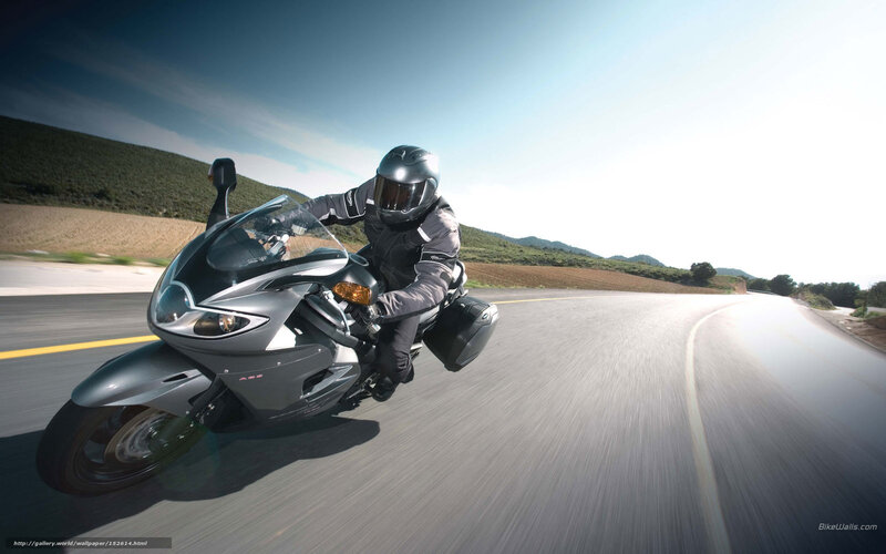 Motorcyclist on a winding road