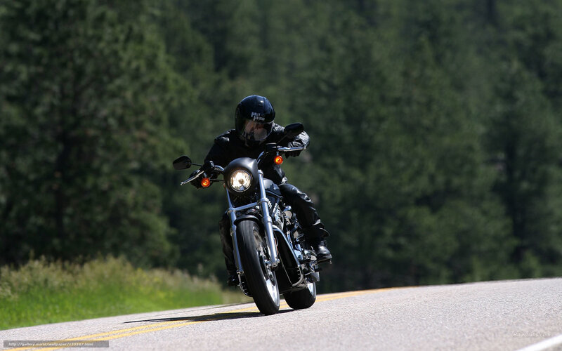 Motorcyclist on a winding road