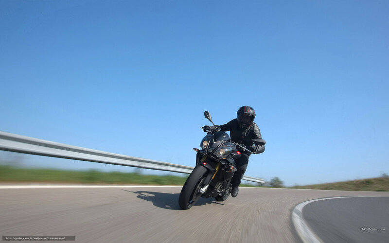 Motorcyclist on a winding road