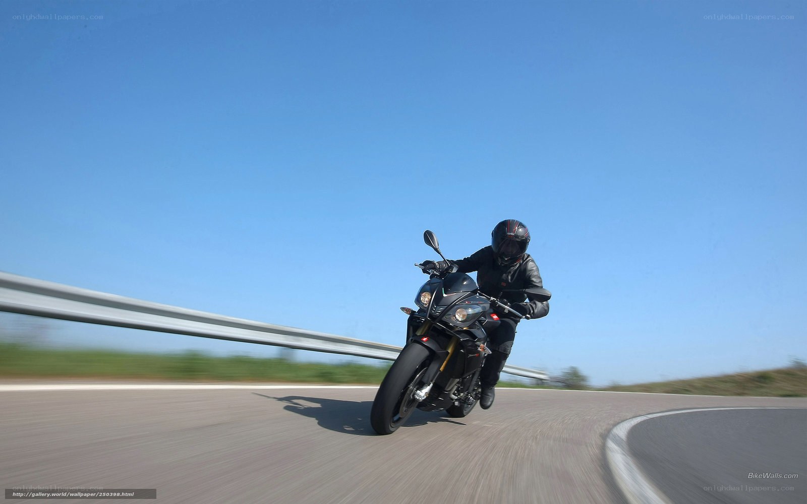 Motorcyclist on a winding road