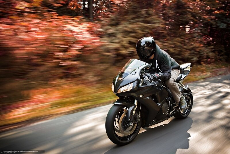 Motorcyclist on a winding road