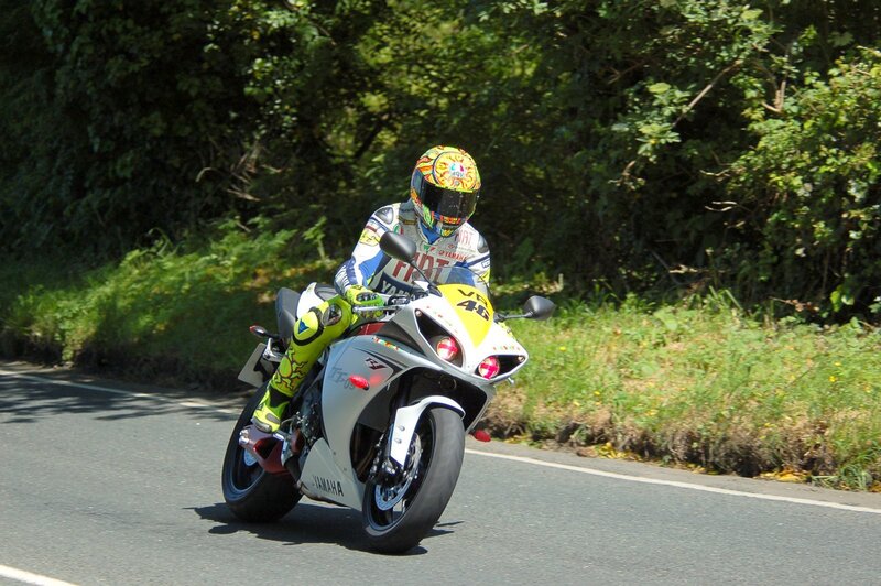 Motorcyclist on a winding road