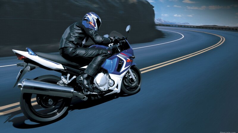 Motorcyclist on a winding road