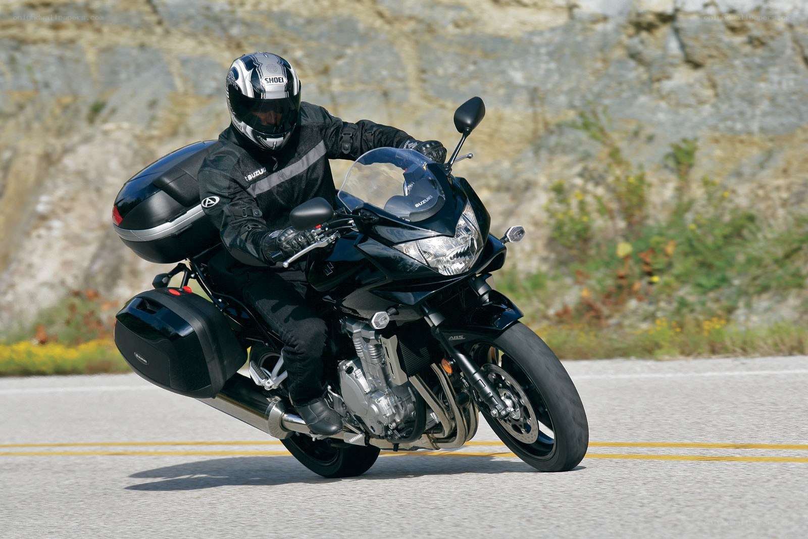 Motorcyclist on a winding road