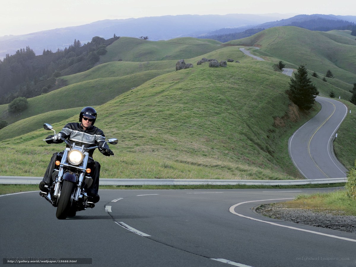 Motorcyclist on a winding road