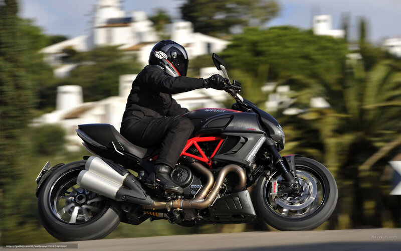Motorcyclist on Black Bike — Dynamic, Afternoon, Photograph, Helmet
