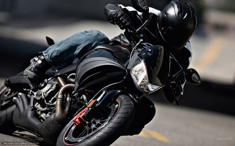 Motorcyclist on Black Bike — Dynamic