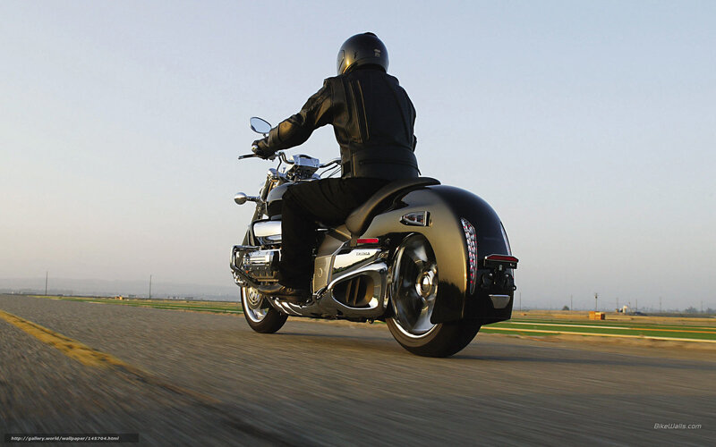 Motorcyclist on Black Motorcycle — Calm