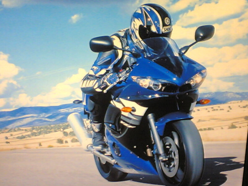 Motorcyclist on Blue Bike — Dynamic, Afternoon