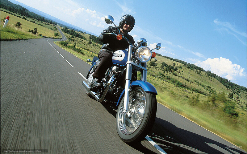 Motorcyclist on Blue Bike — Open