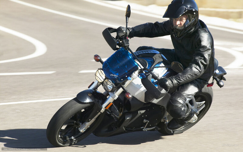Motorcyclist on Blue Motorcycle — Dynamic